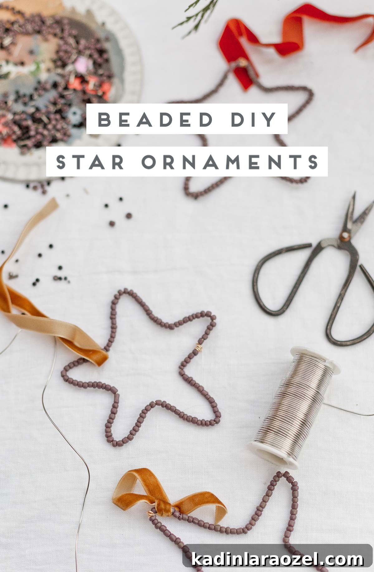 DIY Beaded Christmas Ornaments: Step-by-Step Holiday Craft Guide 4 Beaded ornaments with supplies laid out on a table.