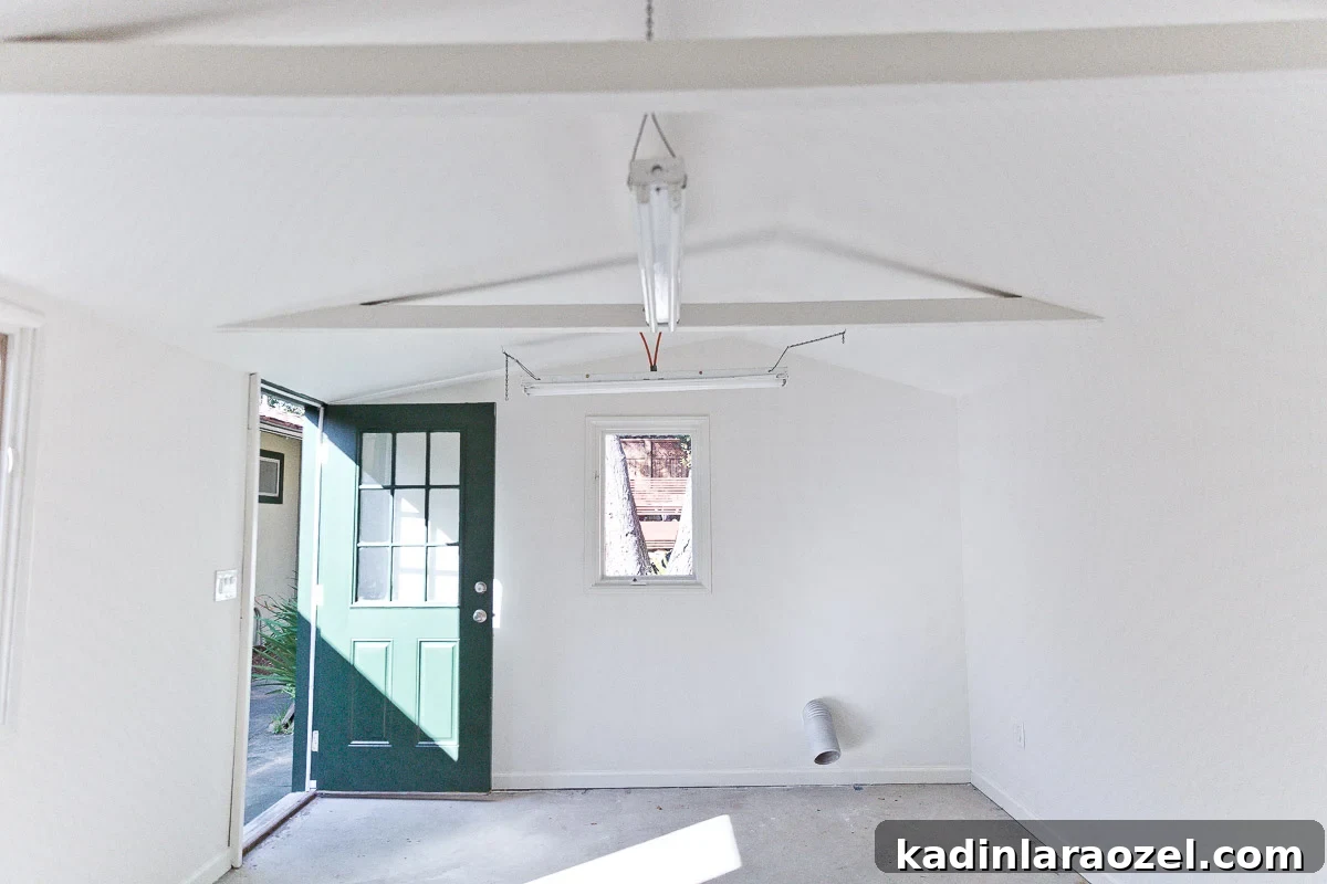Photo of all-white, empty home office space.