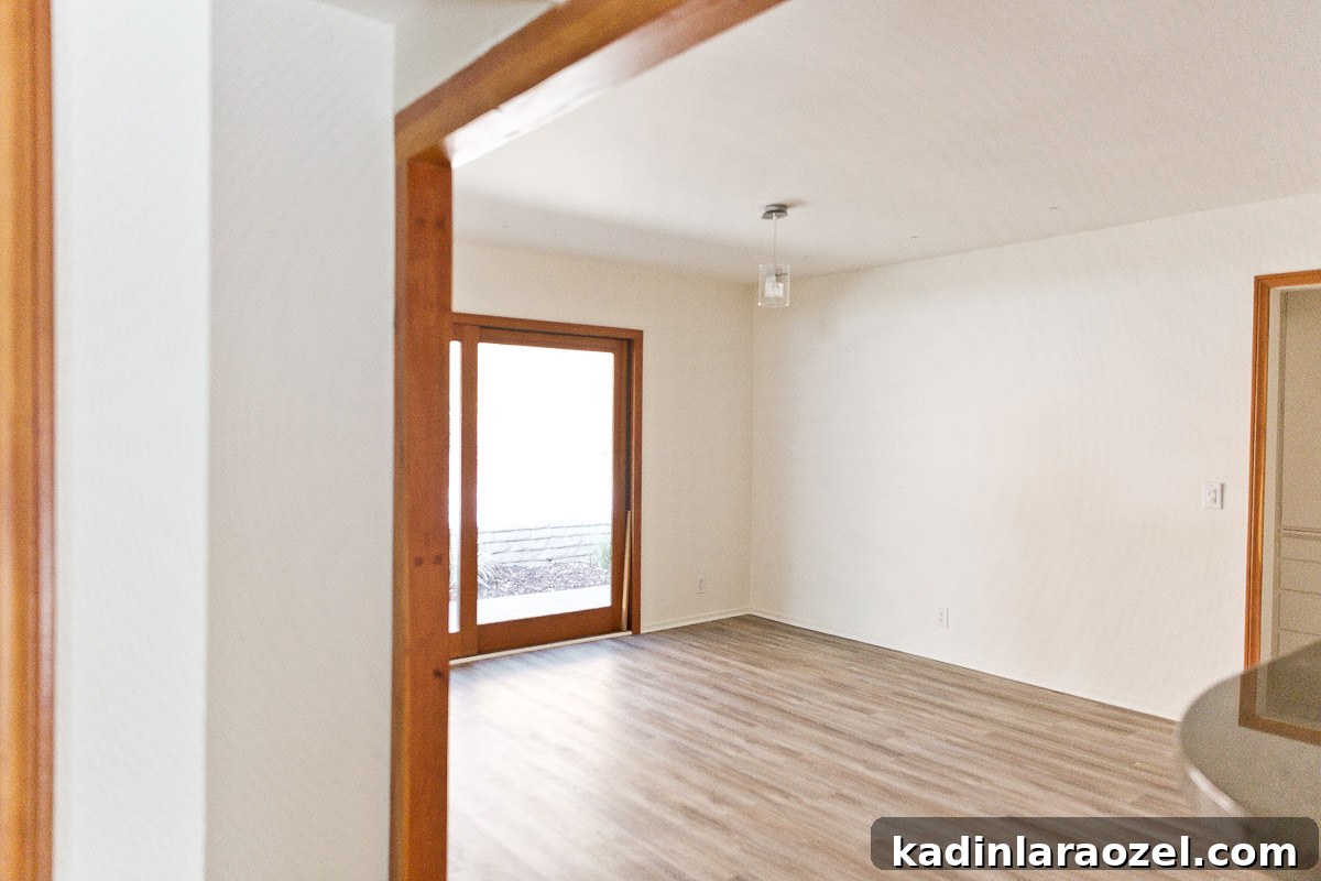Photo of empty dining room in smaller 60s home.