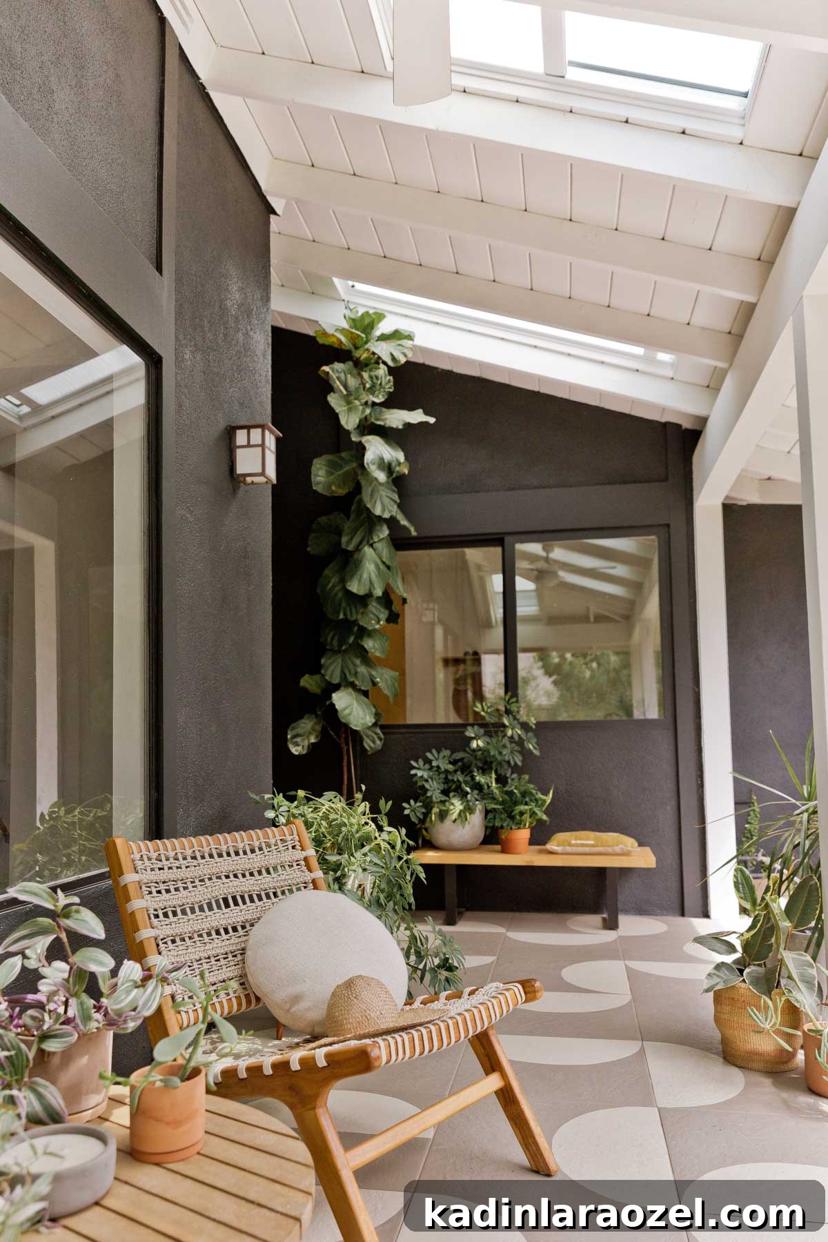 Porch Tile Painting Guide: Transform Your Floor in One Weekend 4 Modern black front porch with painted floor tiles and modern furniture.