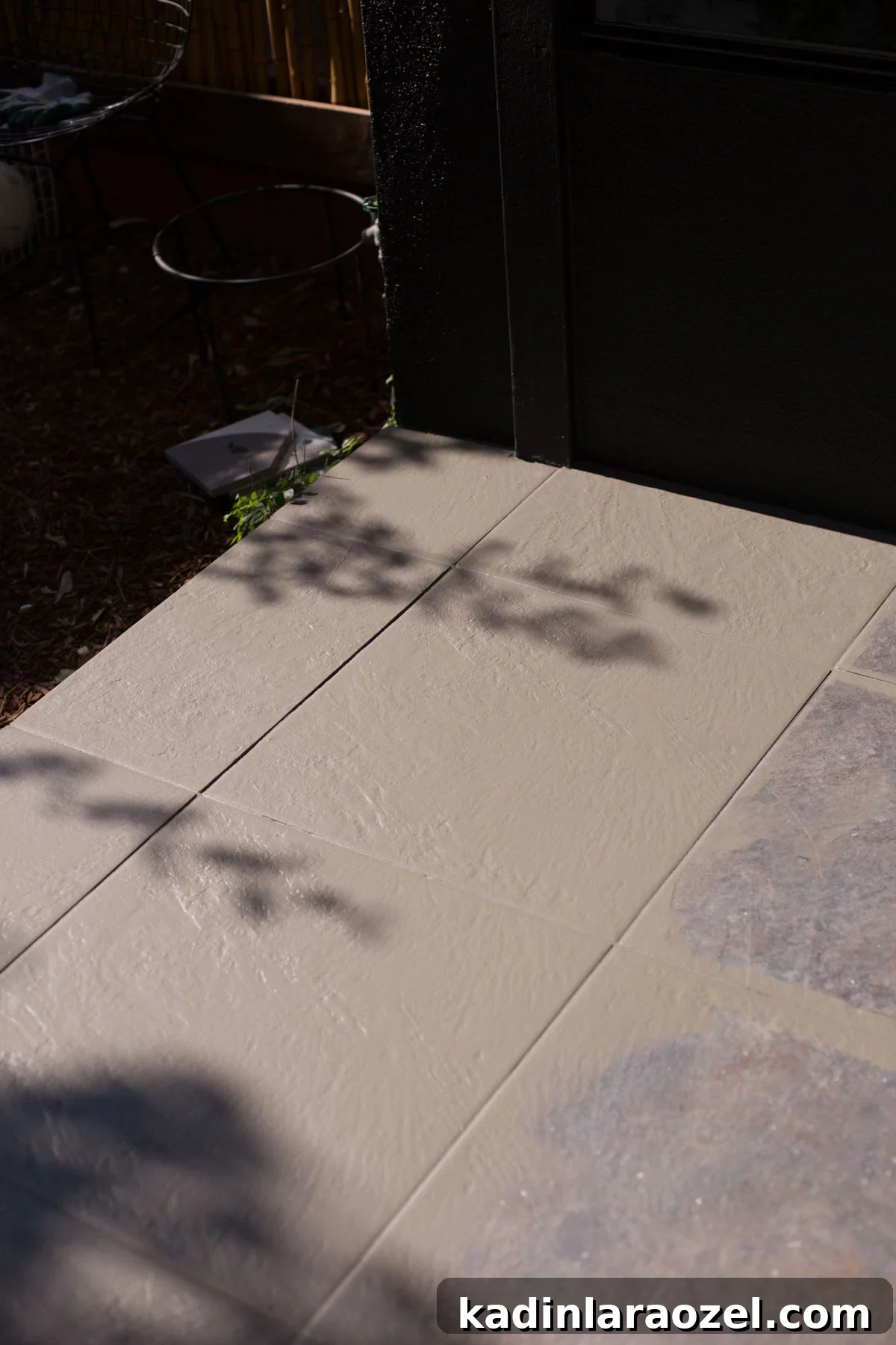 Porch Tile Painting Guide: Transform Your Floor in One Weekend 5 Painting floor tiles grey on a front porch.