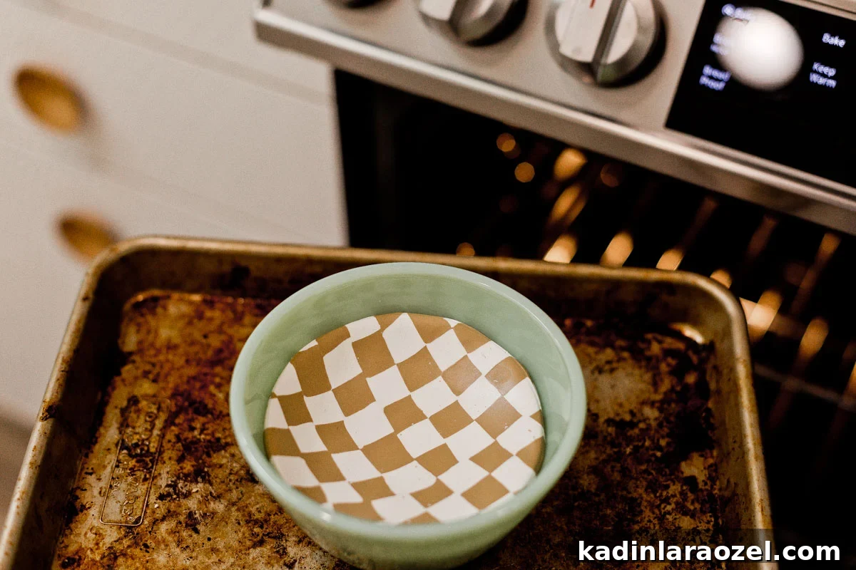 Putting oven bake clay in oven.