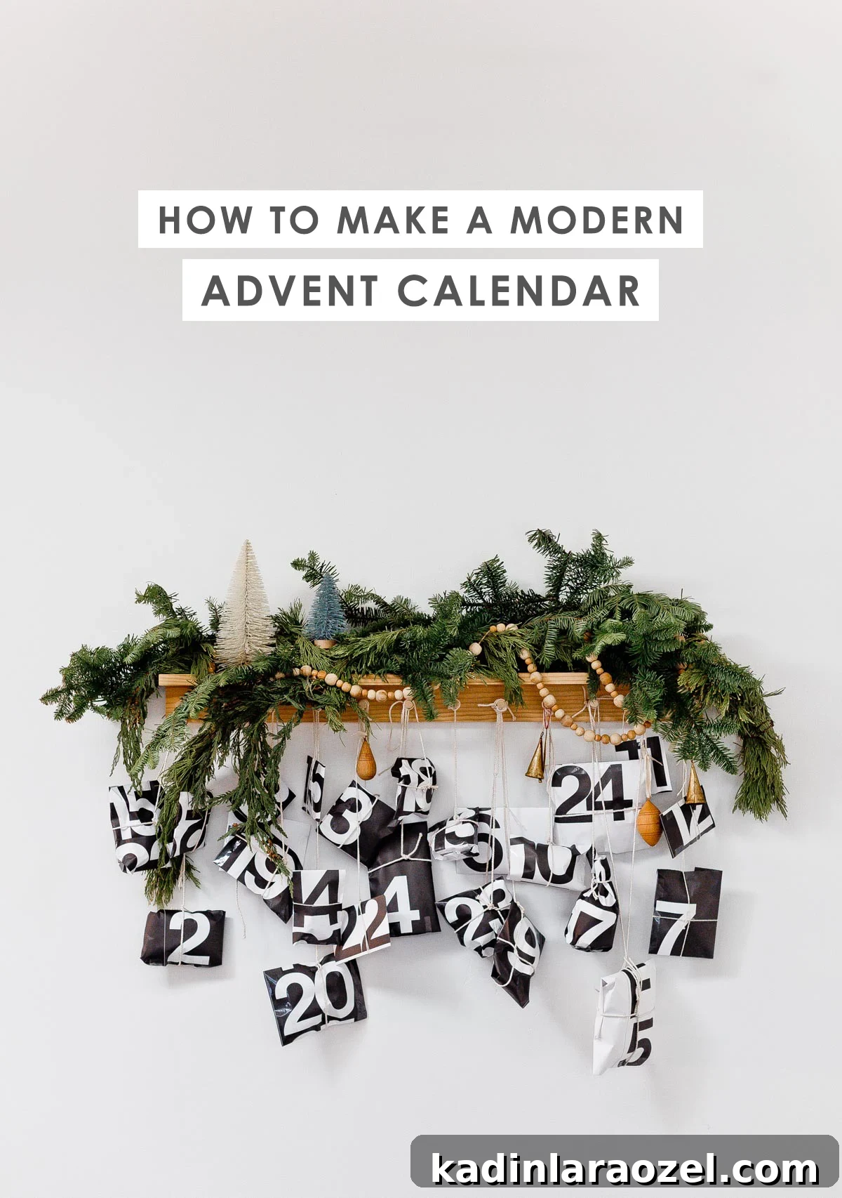 50 Advent Calendar Ideas to Delight Every Day in December 6 Deconstructed advent calendar hanging from a peg rail with Christmas trees and garland