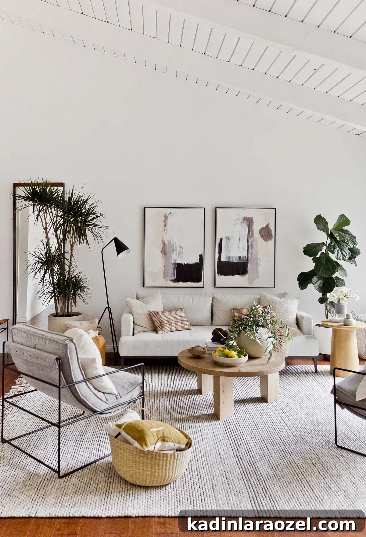 White living room with neutral furniture and accessories