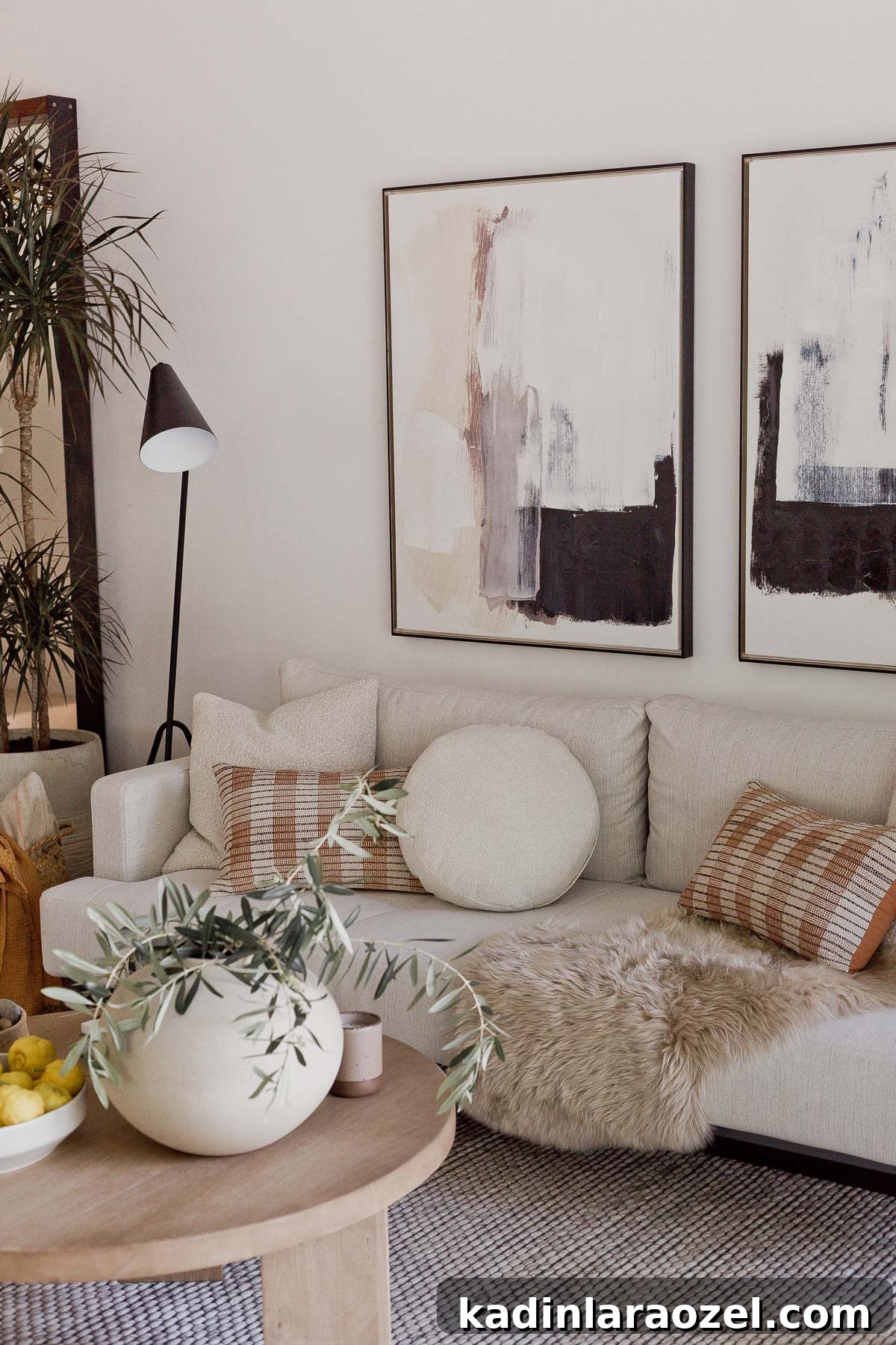Calming living room with creamy textures and wood accents