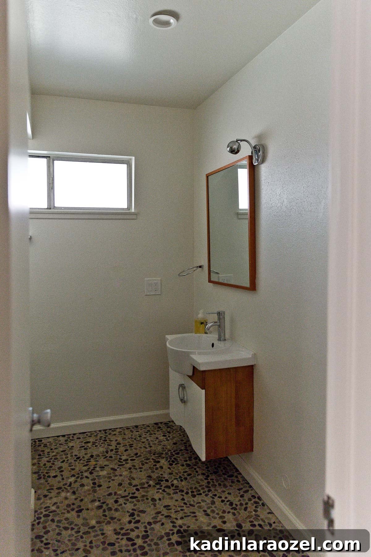 Small Bathroom Makeovers on a Budget: Before and After Ideas 3 Before photo of small and dark guest bathroom