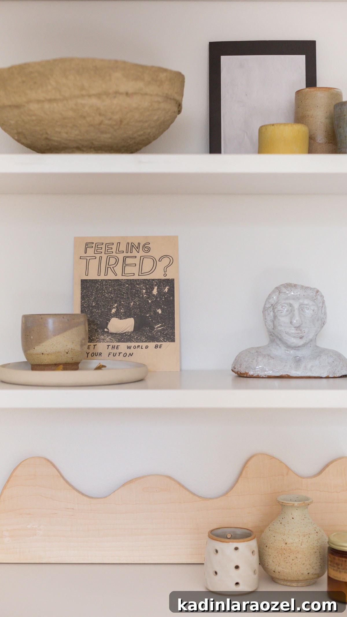 Closet Makeover: Transform Clutter Into a Stylish, Organized Space 6 Artsy details on simply styled white shelves