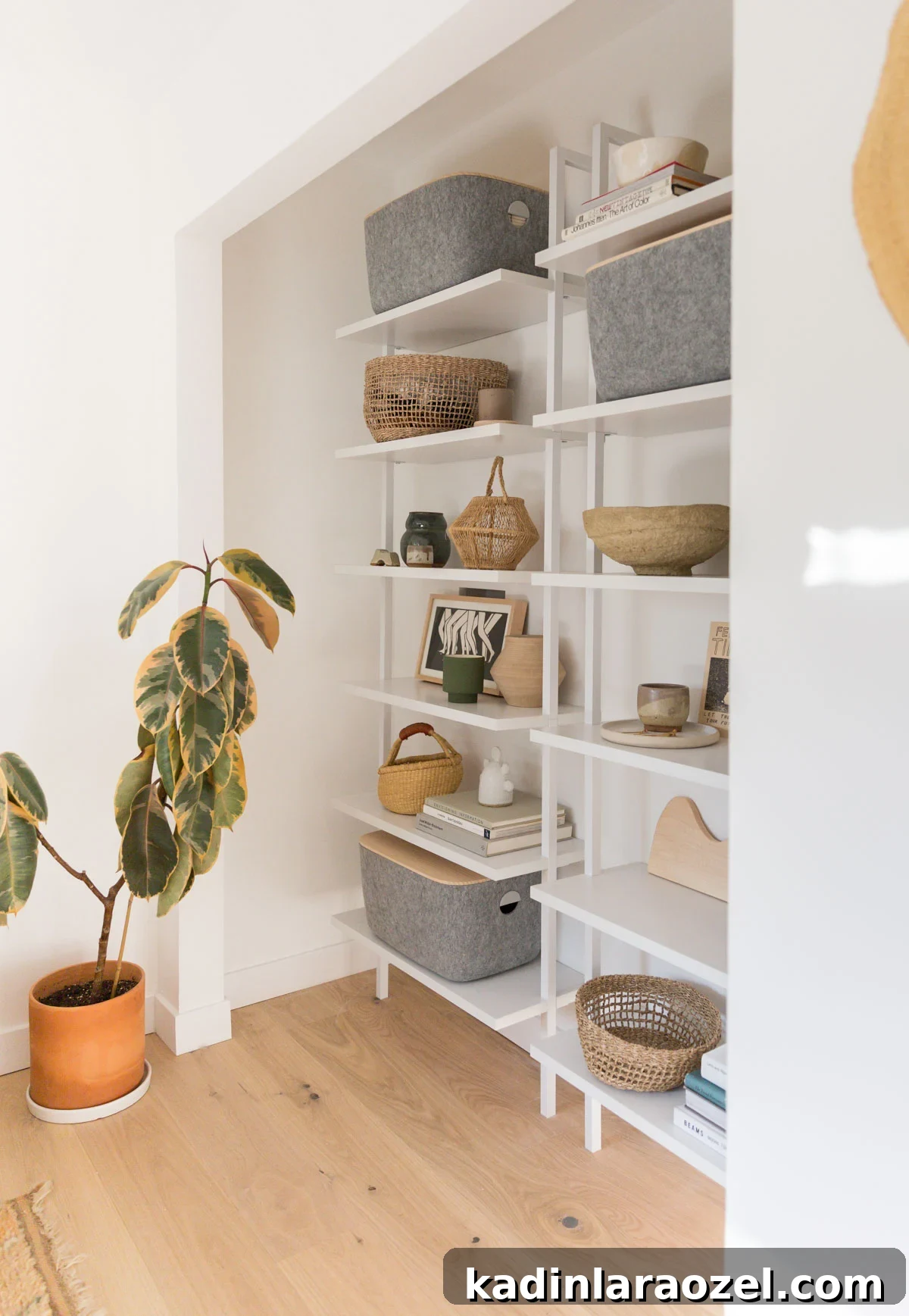 Closet Makeover: Transform Clutter Into a Stylish, Organized Space 8 A simple closets makeover with hardwood floors and sleek white shelves