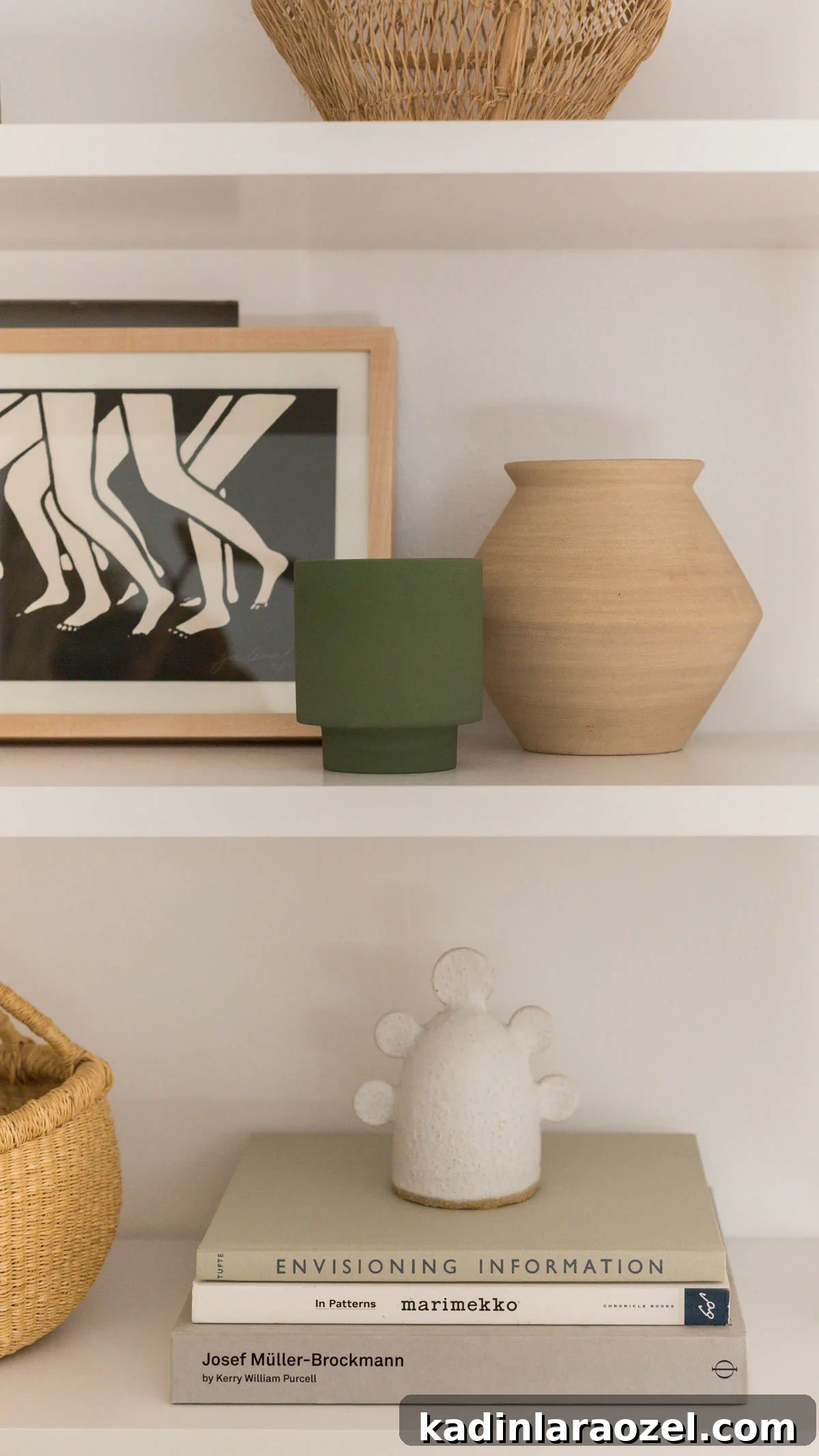 Closet Makeover: Transform Clutter Into a Stylish, Organized Space 9 Graphic black and white artwork with ceramic vases and books on a shelf