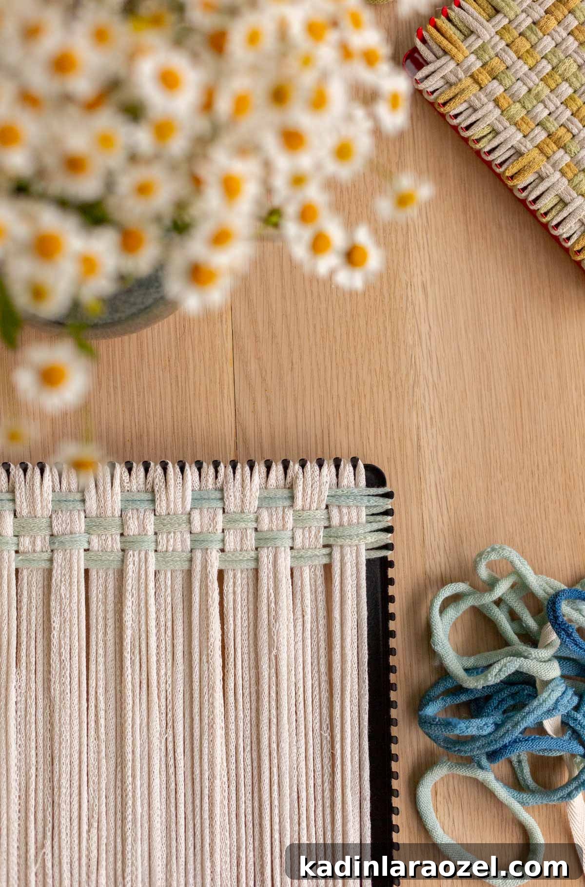 Potholder Loom Weaving: DIY Projects and Techniques 2 starting a weaving on a potholder loom with blue and white loops