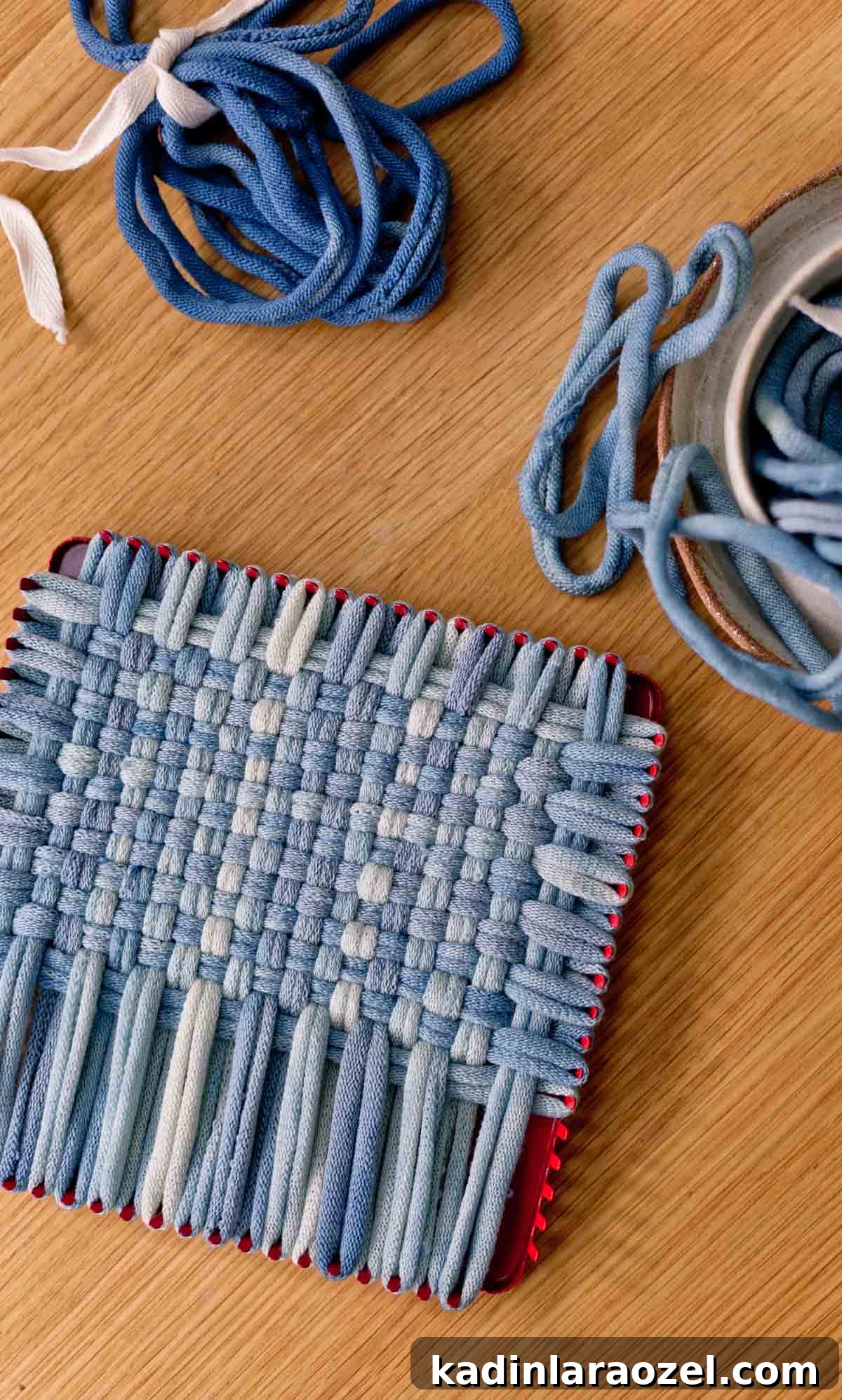 Potholder Loom Weaving: DIY Projects and Techniques 10 indigo blue weaving being done on traditional size potholder loom