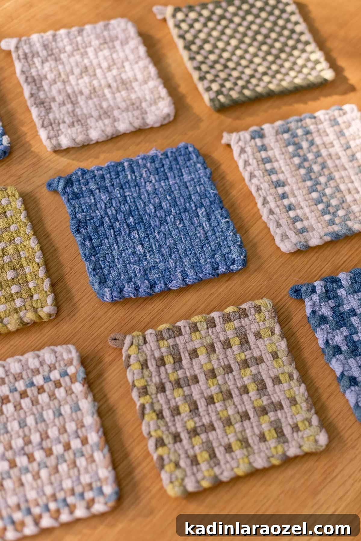 Potholder Loom Weaving: DIY Projects and Techniques 12 handmade woven potholders lined up on a wood table in various earthy colors