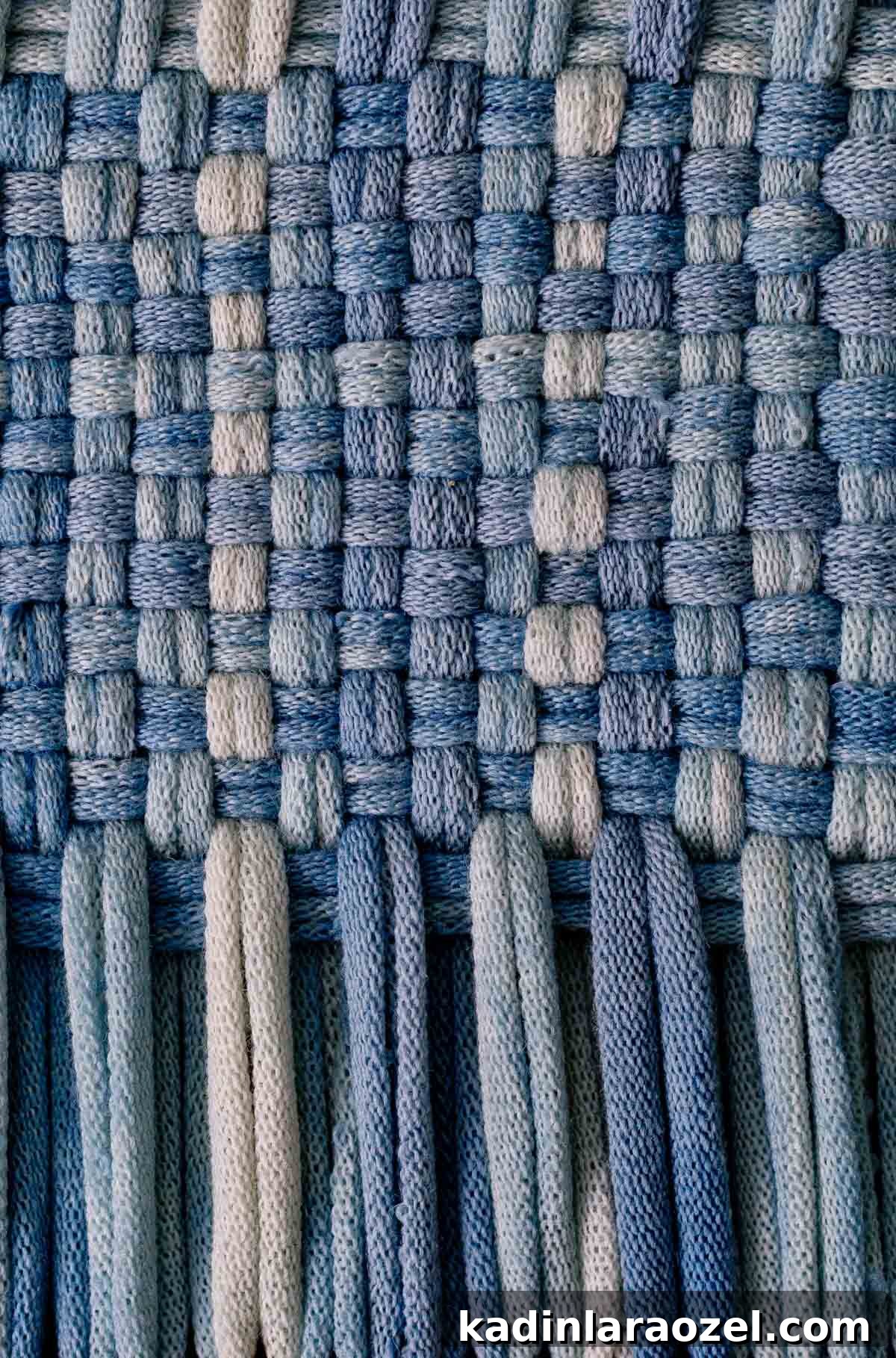 Potholder Loom Weaving: DIY Projects and Techniques 14 indigo blue weaving up close, in the process of being made