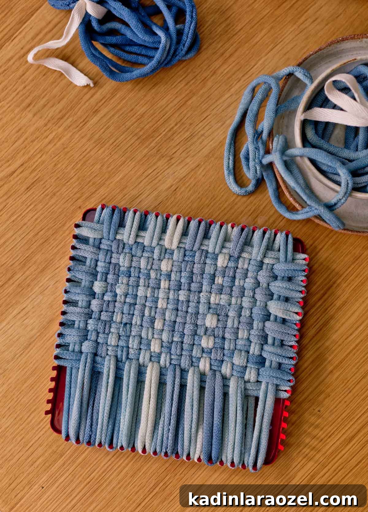Potholder Loom Weaving: DIY Projects and Techniques 3 indigo blue weaving in progress on red potholder loom