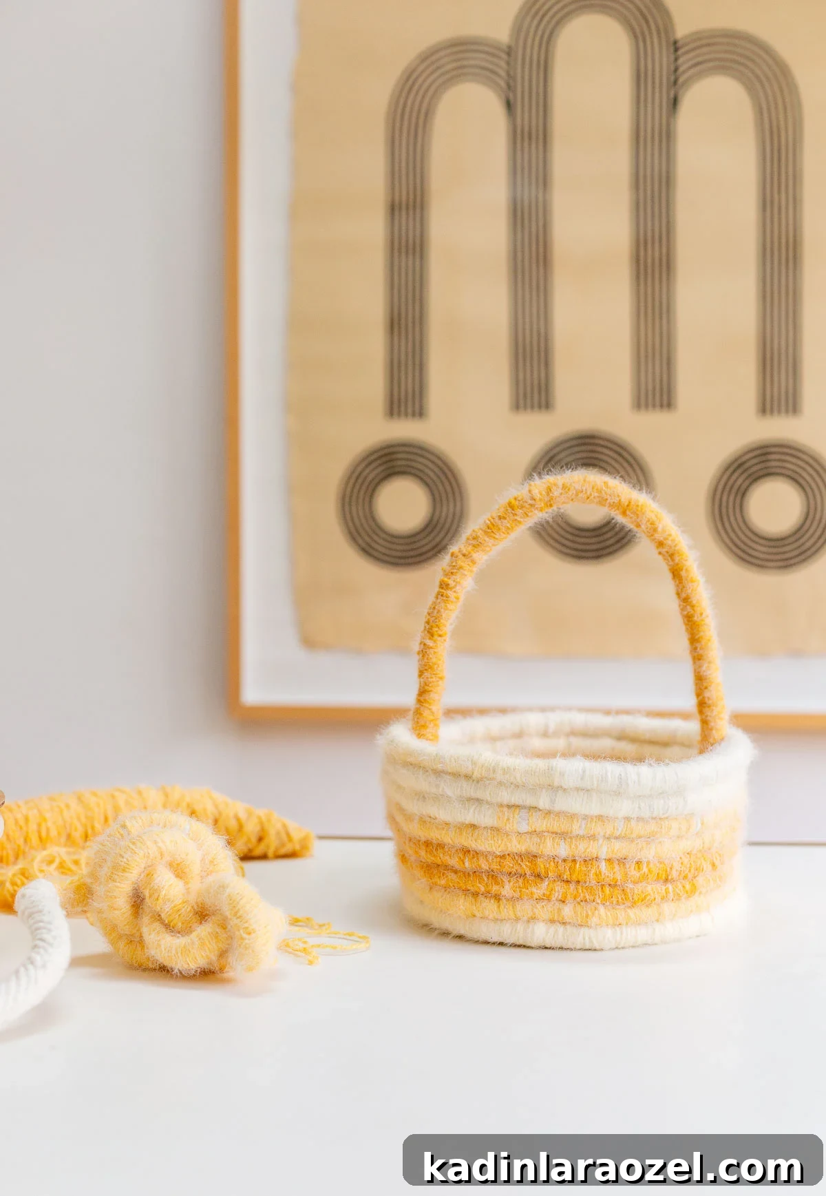 Make an Easter Basket from Scratch: Step-by-Step DIY Guide 12 yellow easter basket sitting on white table with abstract art behind it