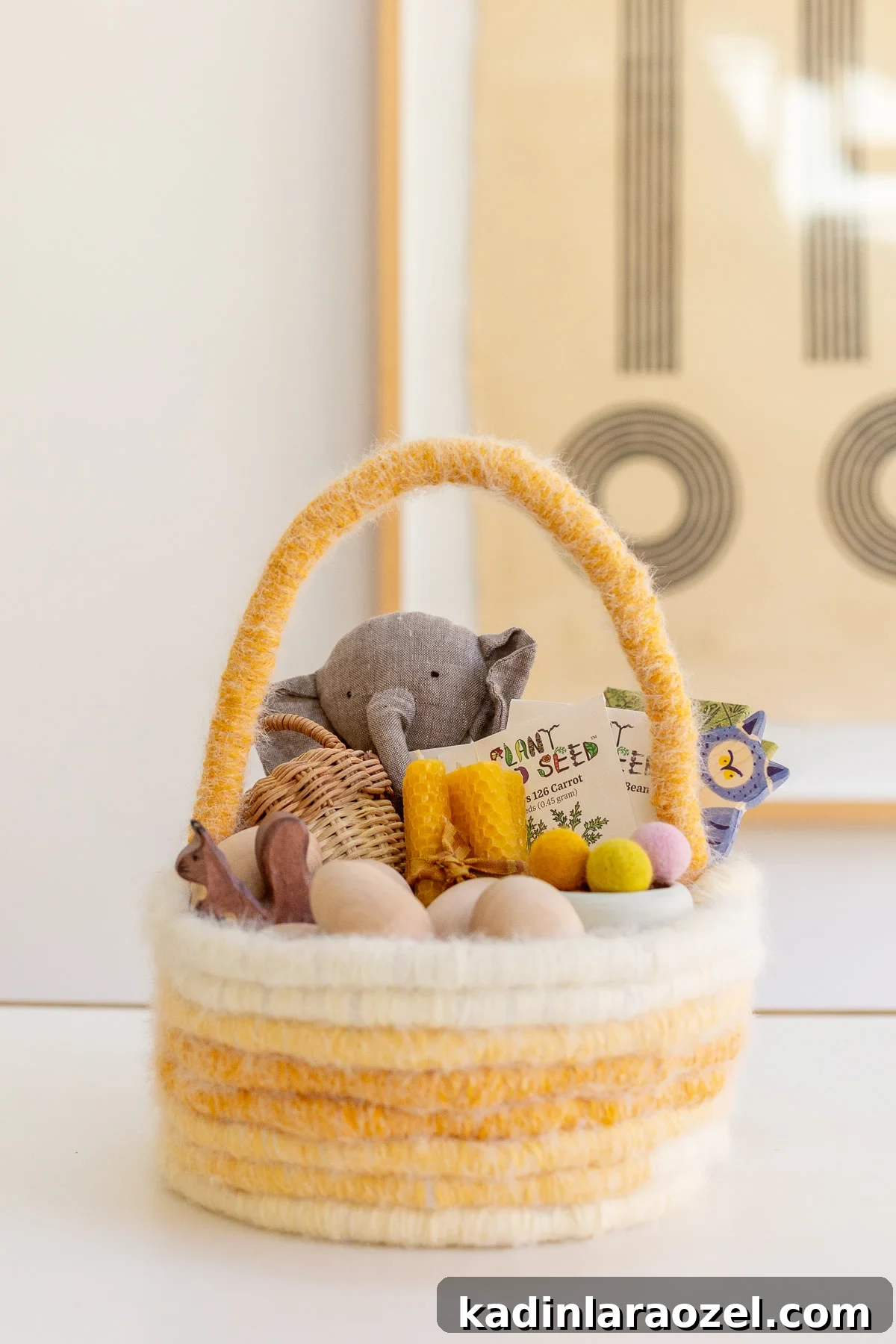 Make an Easter Basket from Scratch: Step-by-Step DIY Guide 13 pastel easter basket made of yarn, with neutral wooden toys and other items for kids