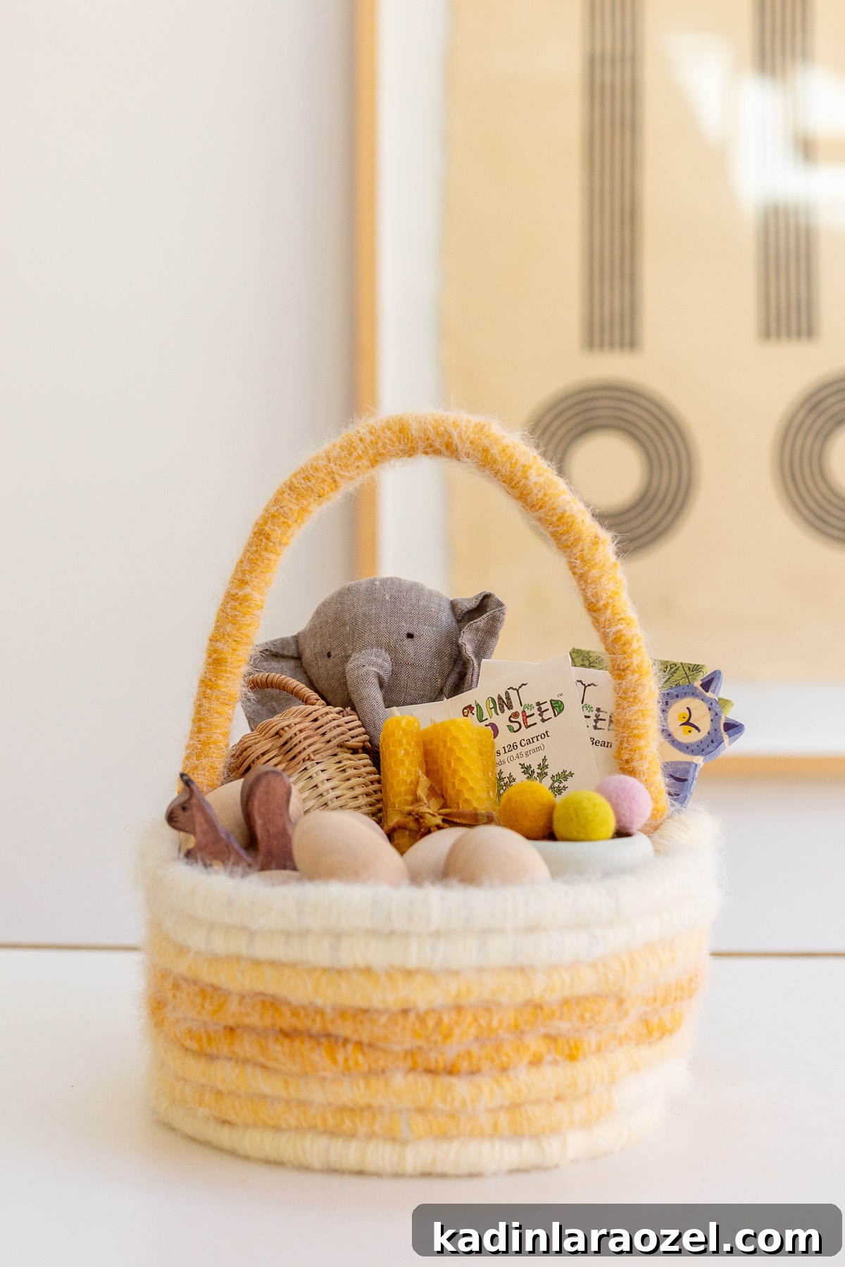 Make an Easter Basket from Scratch: Step-by-Step DIY Guide 3 pastel easter basket with baby and kid items inside, in neutral colors
