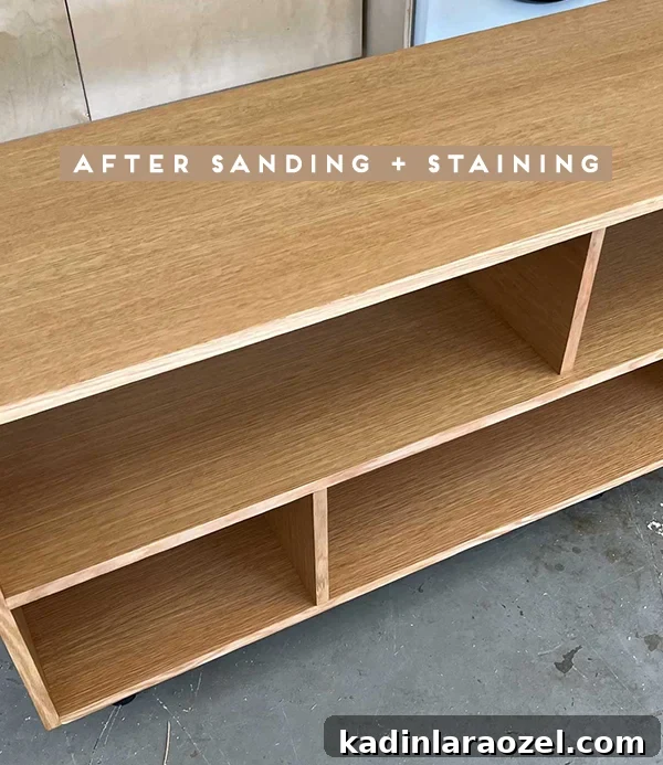Empty wood bookcase after sanding and staining