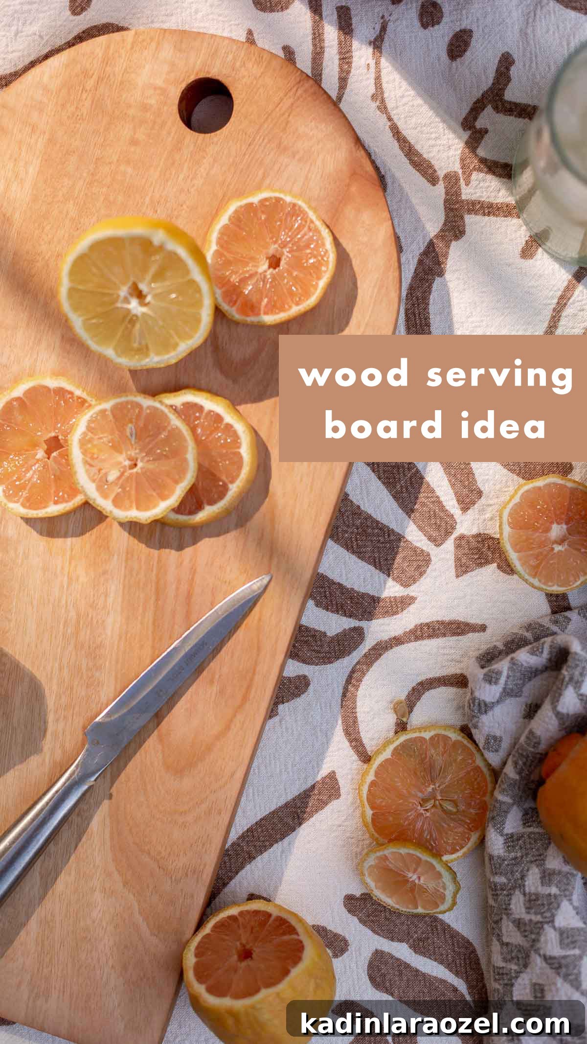 slices lemon on wood arch-shaped cutting board