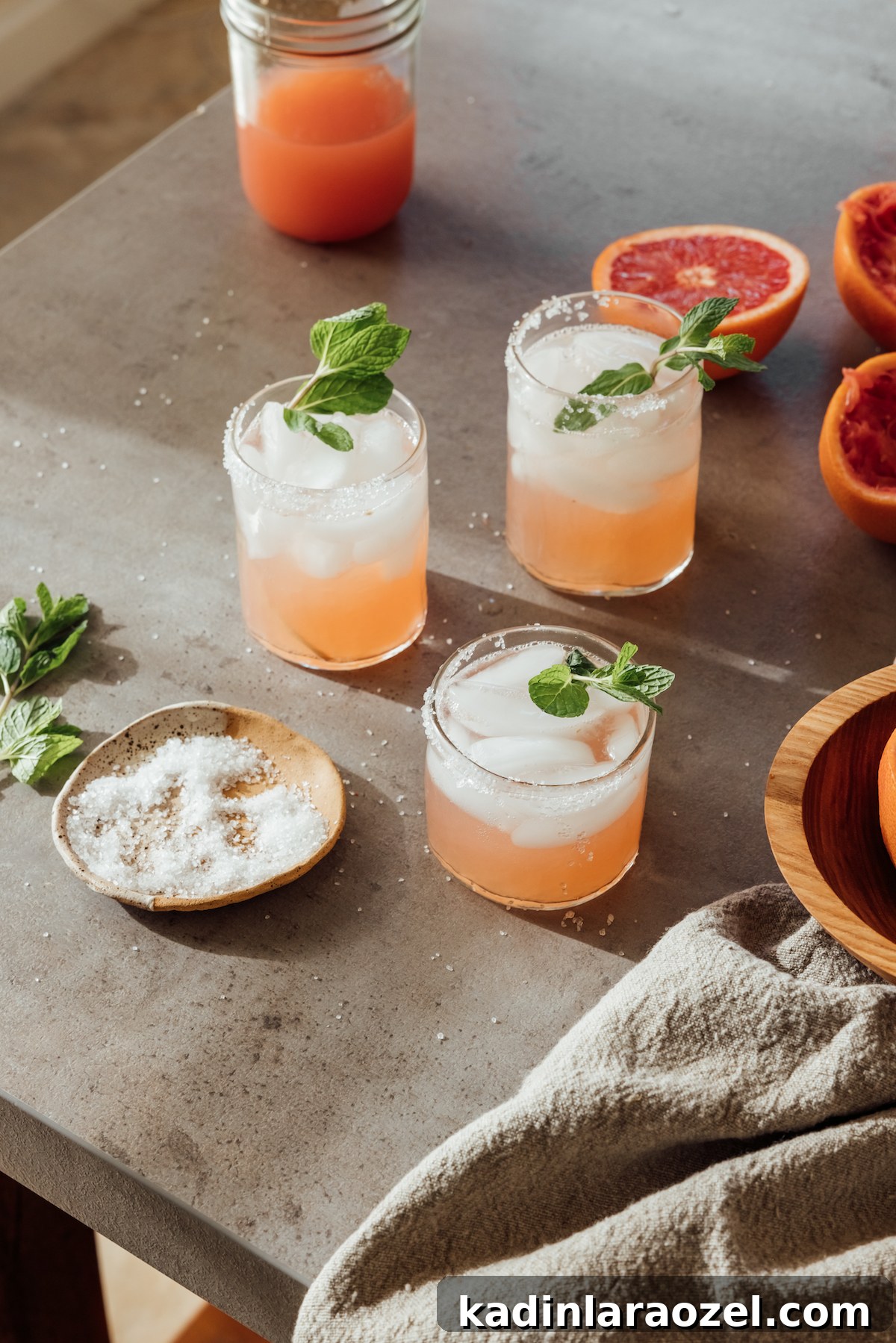 17 Refreshing Summer Cocktails to Try Now 19 salty dog cocktail drinks with grapefruit on a concrete table